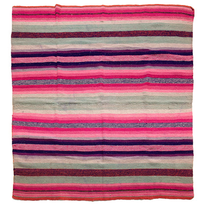 Intiearth vintage Peruvian Frazada textile with colorful geometric patterns and stripes. Traditional handwoven multipurpose textile from Peru, ideal for home décor, can be used as a blanket, rug, throw, or wall hanging. Made of handspun wool and crafted on a backstrap loom.