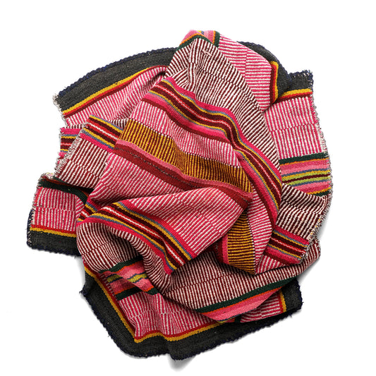 Intiearth vintage Peruvian Frazada textile with colorful geometric patterns and stripes. Traditional handwoven multipurpose textile from Peru, ideal for home décor, can be used as a blanket, rug, throw, or wall hanging. Made of handspun wool and crafted on a backstrap loom.