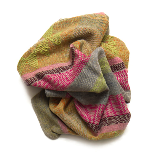 Intiearth vintage Peruvian Frazada textile with colorful geometric patterns and stripes. Traditional handwoven multipurpose textile from Peru, ideal for home décor, can be used as a blanket, rug, throw, or wall hanging. Made of handspun wool and crafted on a backstrap loom.