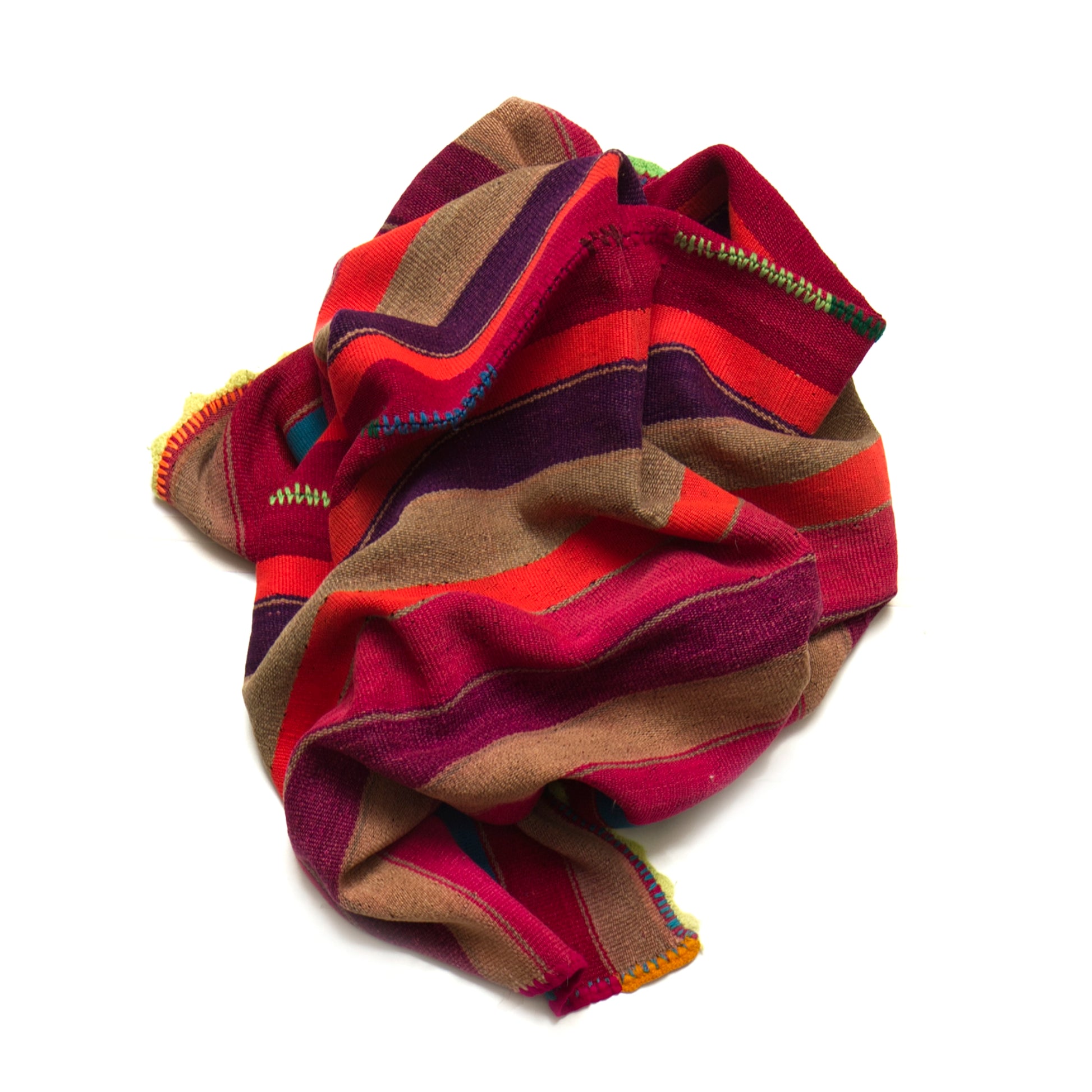 Intiearth vintage Peruvian Frazada textile with colorful geometric patterns and stripes. Traditional handwoven multipurpose textile from Peru, ideal for home décor, can be used as a blanket, rug, throw, or wall hanging. Made of handspun wool and crafted on a backstrap loom.