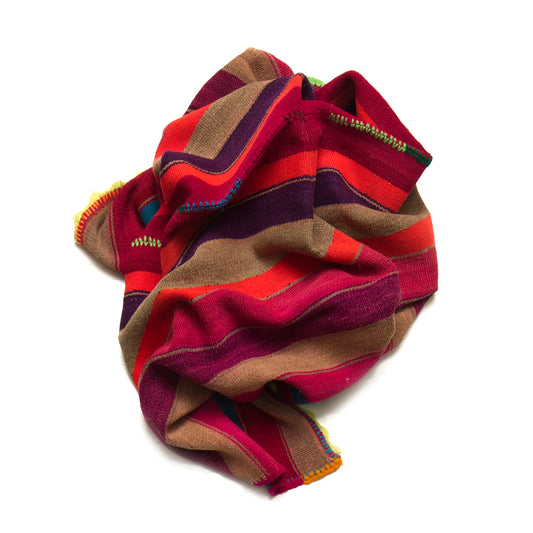 Intiearth vintage Peruvian Frazada textile with colorful geometric patterns and stripes. Traditional handwoven multipurpose textile from Peru, ideal for home décor, can be used as a blanket, rug, throw, or wall hanging. Made of handspun wool and crafted on a backstrap loom.