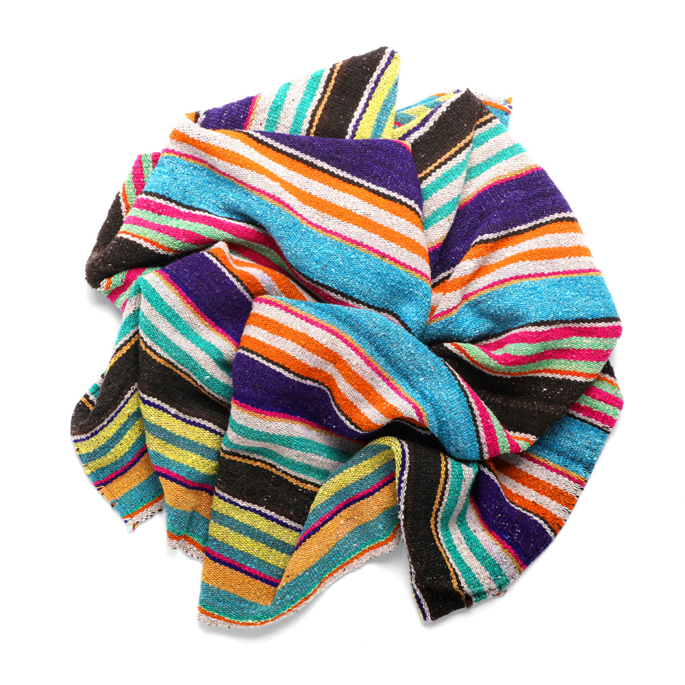 Intiearth vintage Peruvian Frazada textile with colorful geometric patterns and stripes. Traditional handwoven multipurpose textile from Peru, ideal for home décor, can be used as a blanket, rug, throw, or wall hanging. Made of handspun wool and crafted on a backstrap loom.