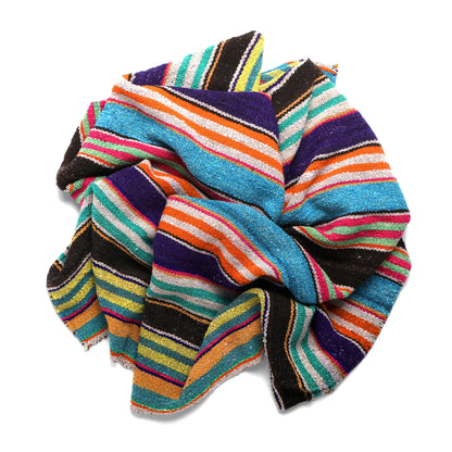 Intiearth vintage Peruvian Frazada textile with colorful geometric patterns and stripes. Traditional handwoven multipurpose textile from Peru, ideal for home décor, can be used as a blanket, rug, throw, or wall hanging. Made of handspun wool and crafted on a backstrap loom.