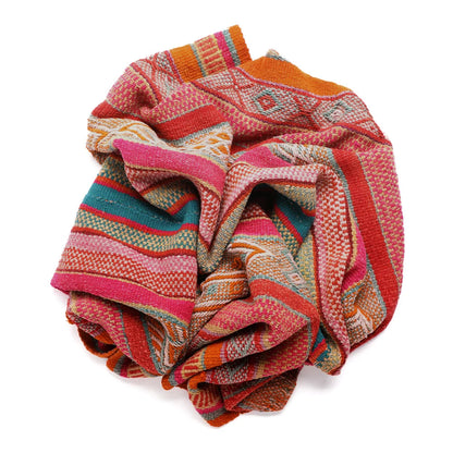 Intiearth vintage Peruvian Frazada textile with colorful geometric patterns and stripes. Traditional handwoven multipurpose textile from Peru, ideal for home décor, can be used as a blanket, rug, throw, or wall hanging. Made of handspun wool and crafted on a backstrap loom.