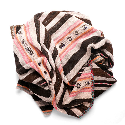 Intiearth vintage Peruvian Frazada textile with colorful geometric patterns and stripes. Traditional handwoven multipurpose textile from Peru, ideal for home décor, can be used as a blanket, rug, throw, or wall hanging. Made of handspun wool and crafted on a backstrap loom.