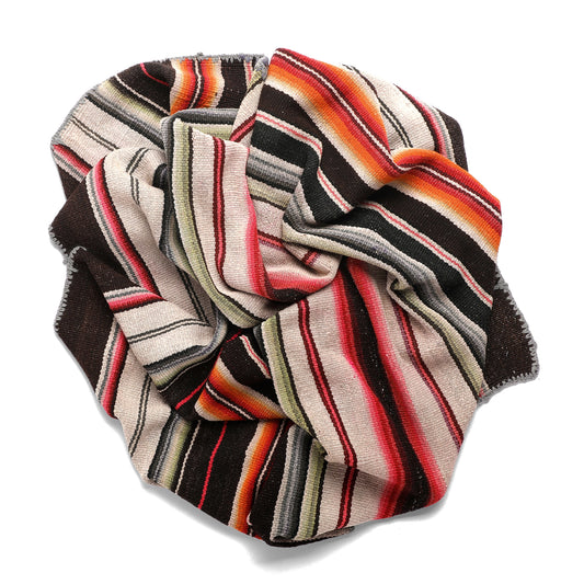 Intiearth vintage Peruvian Frazada textile with colorful geometric patterns and stripes. Traditional handwoven multipurpose textile from Peru, ideal for home décor, can be used as a blanket, rug, throw, or wall hanging. Made of handspun wool and crafted on a backstrap loom.