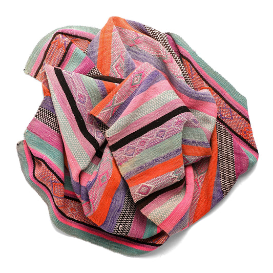 Intiearth vintage Peruvian Frazada textile with colorful geometric patterns and stripes. Traditional handwoven multipurpose textile from Peru, ideal for home décor, can be used as a blanket, rug, throw, or wall hanging. Made of handspun wool and crafted on a backstrap loom.