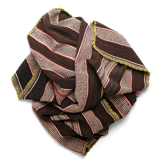 Intiearth vintage Peruvian Frazada textile with colorful geometric patterns and stripes. Traditional handwoven multipurpose textile from Peru, ideal for home décor, can be used as a blanket, rug, throw, or wall hanging. Made of handspun wool and crafted on a backstrap loom.