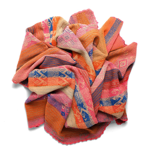 Intiearth vintage Peruvian Frazada textile with colorful geometric patterns and stripes. Traditional handwoven multipurpose textile from Peru, ideal for home décor, can be used as a blanket, rug, throw, or wall hanging. Made of handspun wool and crafted on a backstrap loom.