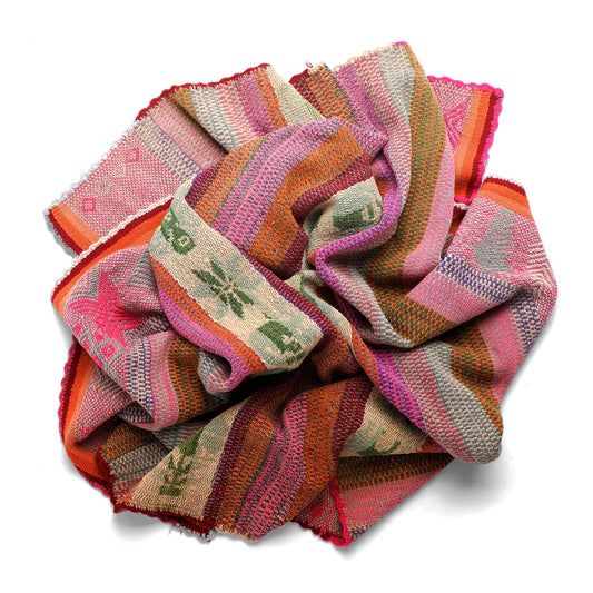 Intiearth vintage Peruvian Frazada textile with colorful geometric patterns and stripes. Traditional handwoven multipurpose textile from Peru, ideal for home décor, can be used as a blanket, rug, throw, or wall hanging. Made of handspun wool and crafted on a backstrap loom.