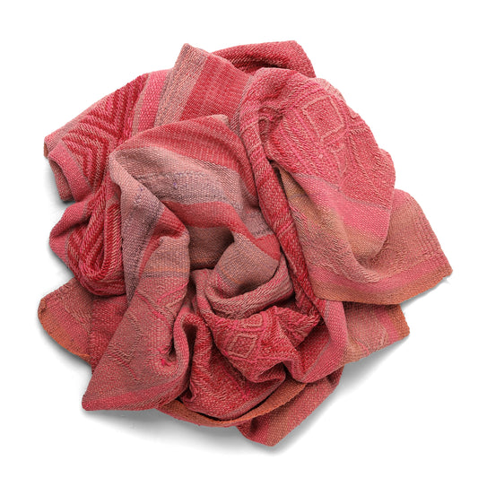 Pink textured frazada on a white background