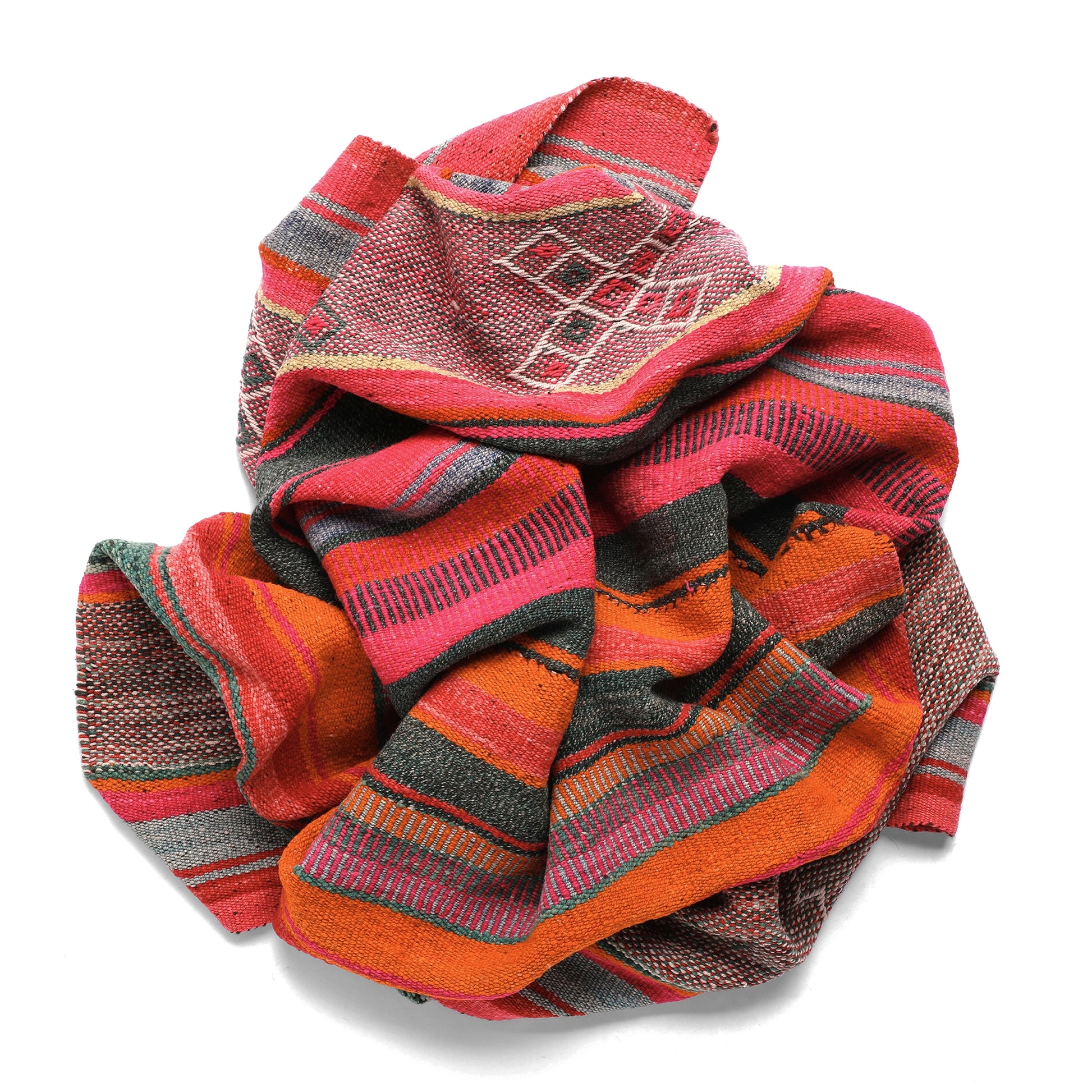 Intiearth vintage Peruvian Frazada textile with colorful geometric patterns and stripes. Traditional handwoven multipurpose textile from Peru, ideal for home décor, can be used as a blanket, rug, throw, or wall hanging. Made of handspun wool and crafted on a backstrap loom.