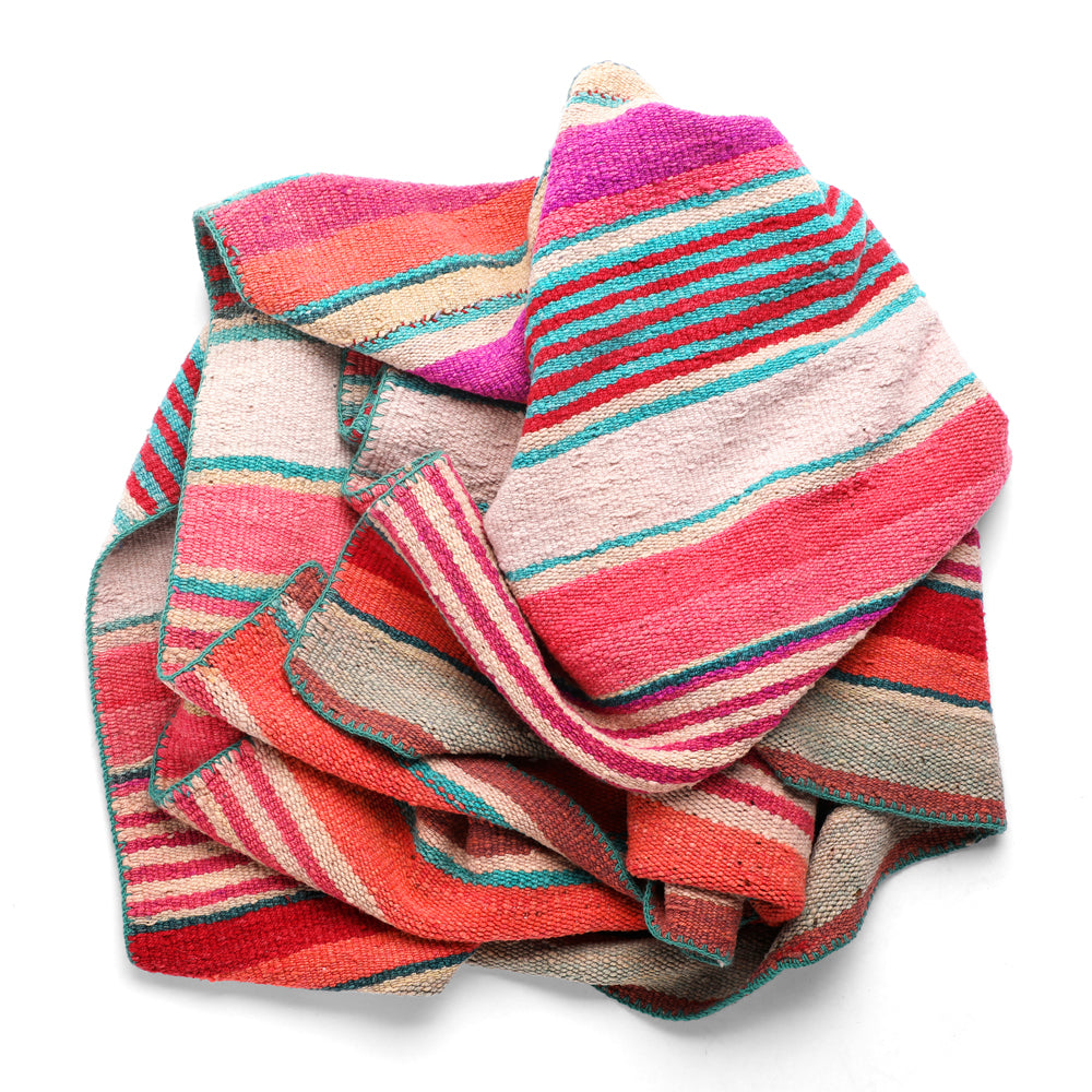 Intiearth vintage Peruvian Frazada textile with colorful geometric patterns and stripes. Traditional handwoven multipurpose textile from Peru, ideal for home décor, can be used as a blanket, rug, throw, or wall hanging. Made of handspun wool and crafted on a backstrap loom.