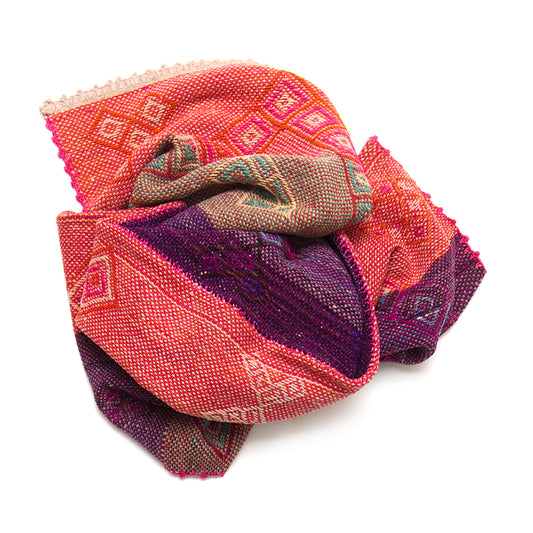 Vintage Peruvian Frazada textile with colorful geometric patterns and stripes. Traditional handwoven multipurpose textile from Peru, ideal for home décor, blankets, or throws, or rug.