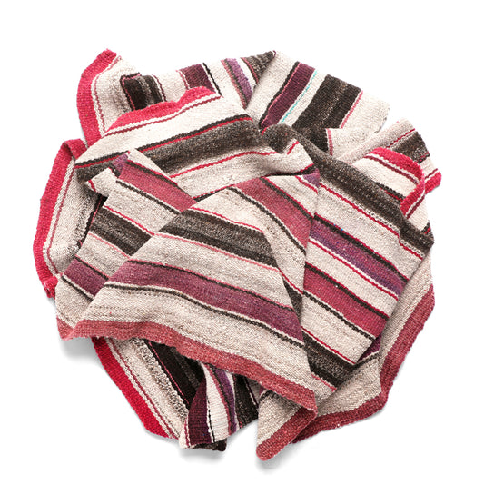 Intiearth vintage Peruvian Frazada textile with colorful geometric patterns and stripes. Traditional handwoven multipurpose textile from Peru, ideal for home décor, can be used as a blanket, rug, throw, or wall hanging. Made of handspun wool and crafted on a backstrap loom.