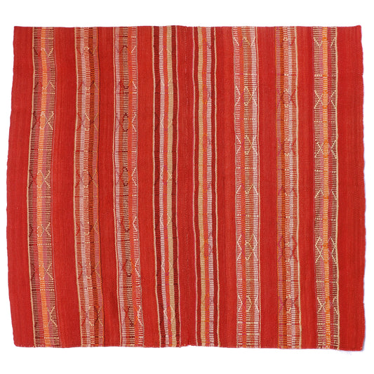 Red woven intiearth frazada with a subtle pattern on a white background