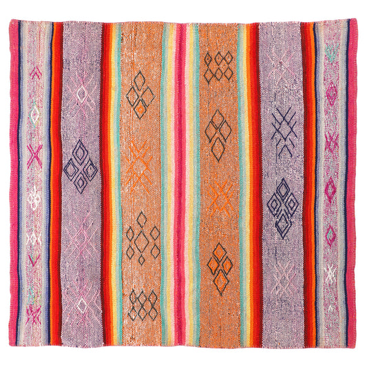 Intiearth vintage Peruvian Frazada textile with colorful geometric patterns and stripes. Traditional handwoven multipurpose textile from Peru, ideal for home décor, can be used as a blanket, rug, throw, or wall hanging. Made of handspun wool and crafted on a backstrap loom.