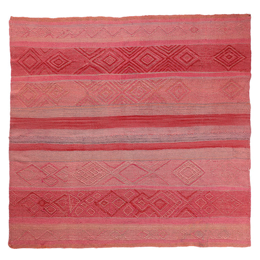 Pink textured frazada on a white background