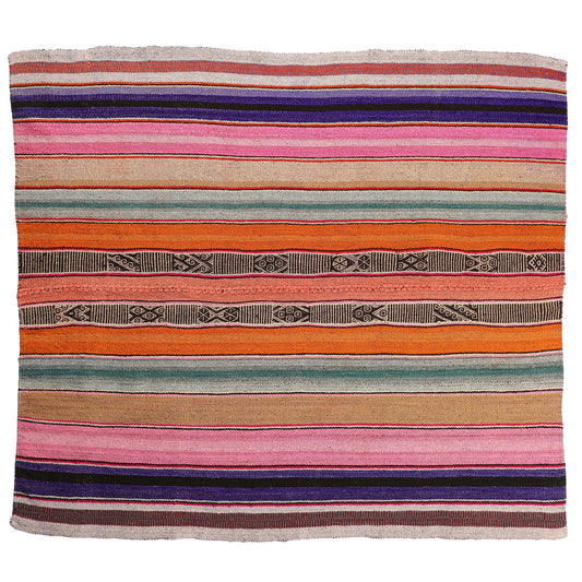 Intiearth vintage Peruvian Frazada textile with colorful geometric patterns and stripes. Traditional handwoven multipurpose textile from Peru, ideal for home décor, can be used as a blanket, rug, throw, or wall hanging. Made of handspun wool and crafted on a backstrap loom.