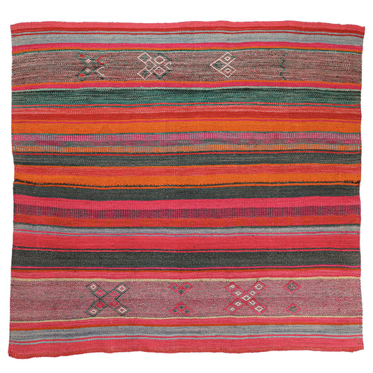Intiearth vintage Peruvian Frazada textile with colorful geometric patterns and stripes. Traditional handwoven multipurpose textile from Peru, ideal for home décor, can be used as a blanket, rug, throw, or wall hanging. Made of handspun wool and crafted on a backstrap loom.