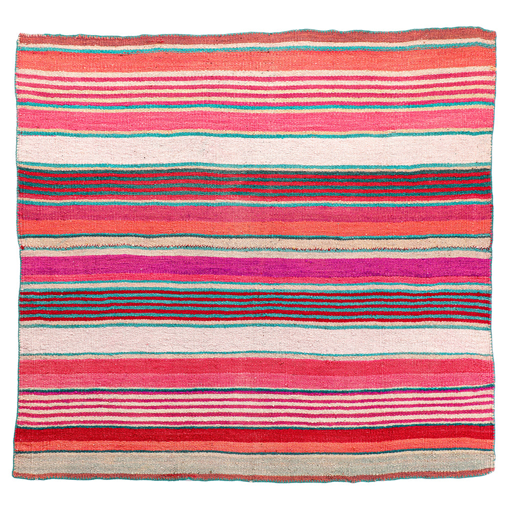 Intiearth vintage Peruvian Frazada textile with colorful geometric patterns and stripes. Traditional handwoven multipurpose textile from Peru, ideal for home décor, can be used as a blanket, rug, throw, or wall hanging. Made of handspun wool and crafted on a backstrap loom.
