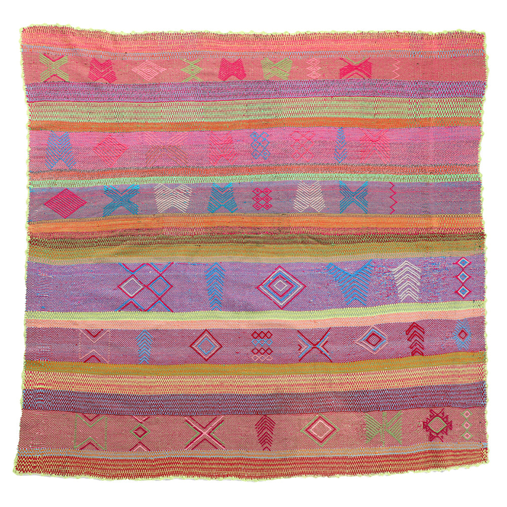 Intiearth vintage Peruvian Frazada textile with colorful geometric patterns and stripes. Traditional handwoven multipurpose textile from Peru, ideal for home décor, can be used as a blanket, rug, throw, or wall hanging. Made of handspun wool and crafted on a backstrap loom.