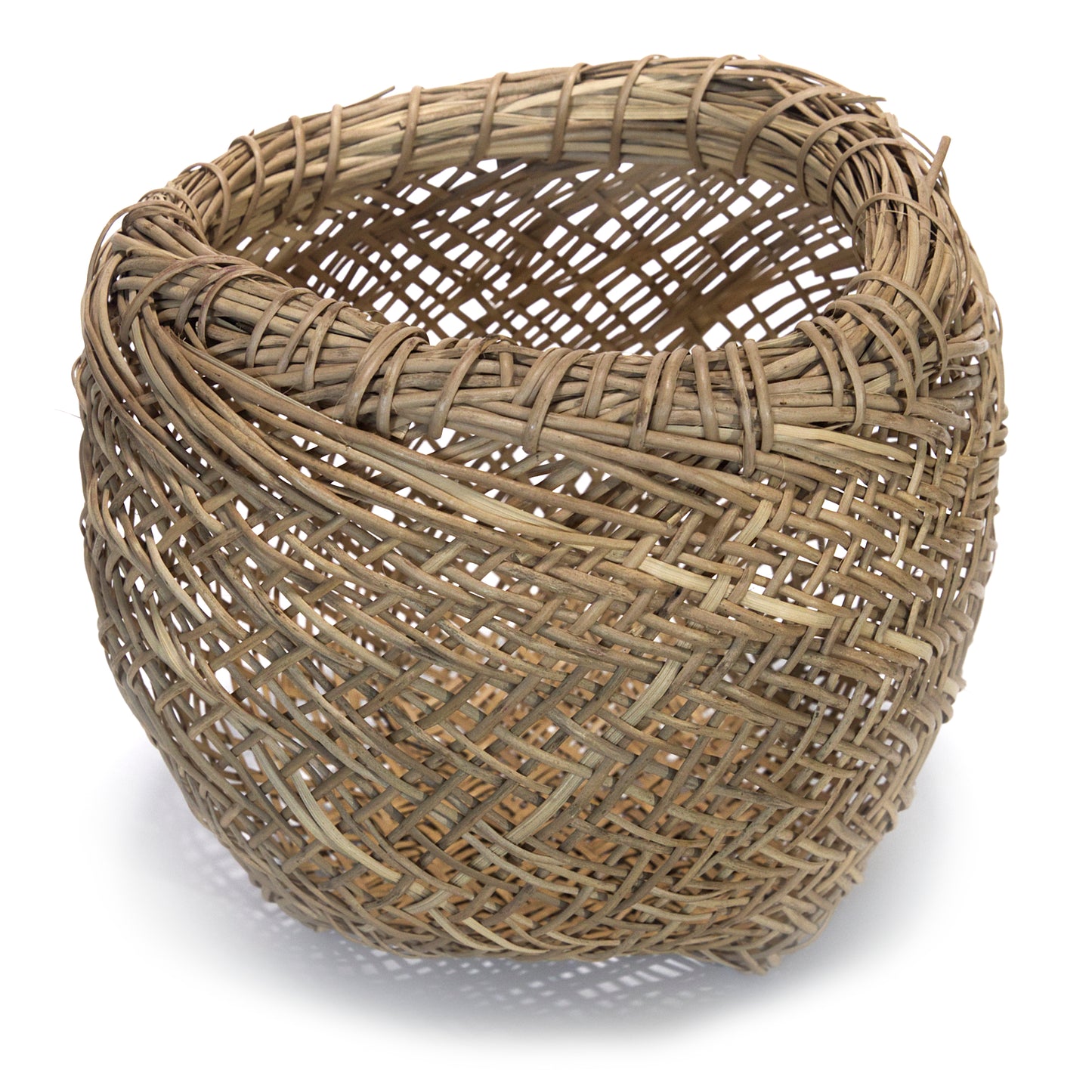 Woven wicker basket on a white background