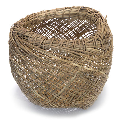 Woven wicker basket on a white background