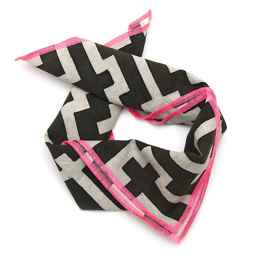 Handcrafted Shipibo bandana made from traditional fabric, featuring intricate geometric kené designs painted with natural pigments. Each piece is one-of-a-kind, reflecting the spiritual intention and energy of the artist. The vibrant patterns represent sacred Ikaros healing songs, offering protection, connection, and transformation, deeply rooted in Shipibo-Conibo culture and tradition