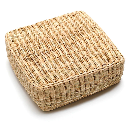 Square woven basket on a white background