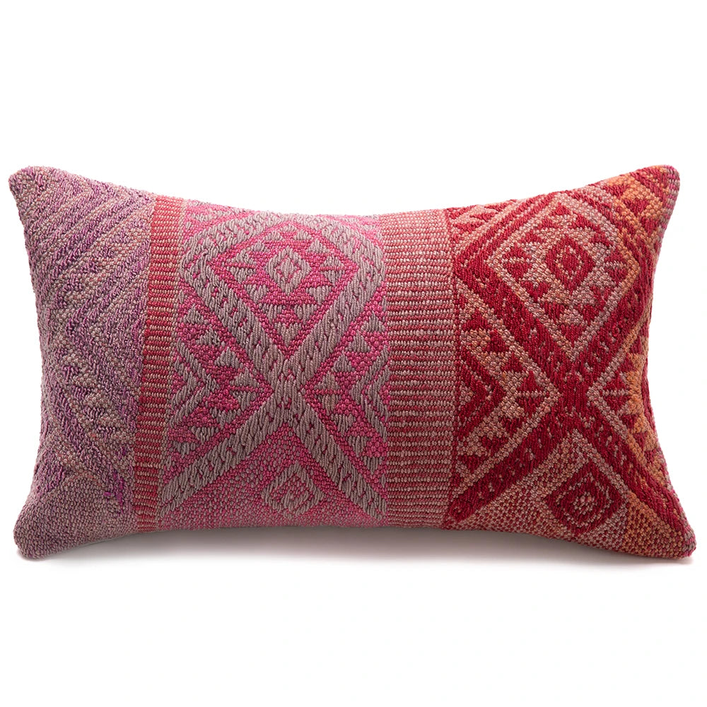 Decorative pillow with geometric pattern on a white background