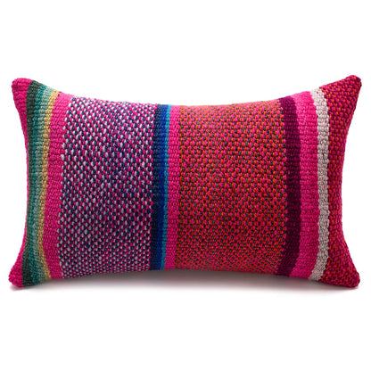 Colorful woven pillow on a white background