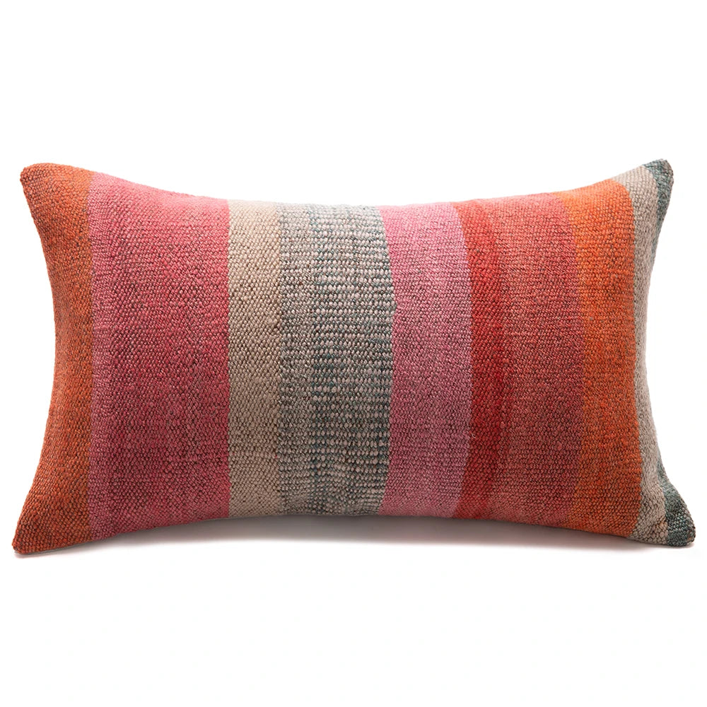 Striped pillow with multicolor pattern on a white background