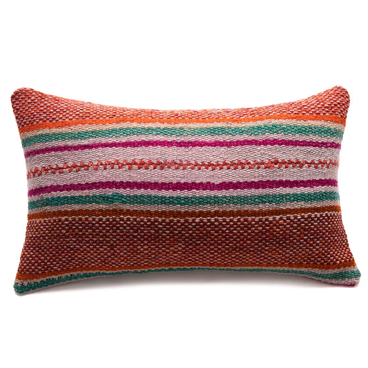 Multicolored striped pillow on a white background