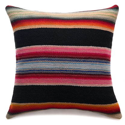 A square throw pillow featuring a colorful horizontal striped pattern inspired by a serape blanket, set against a plain white background.