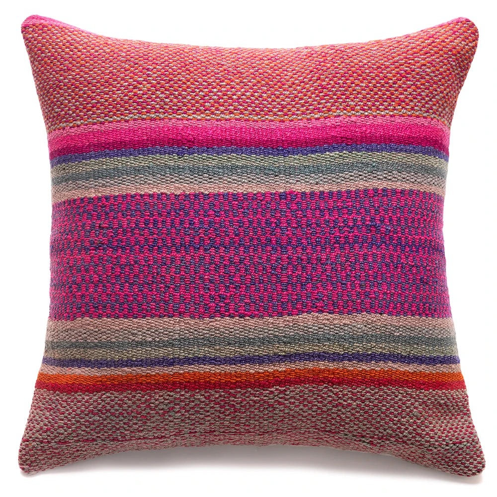 Multicolored striped pillow on a white background