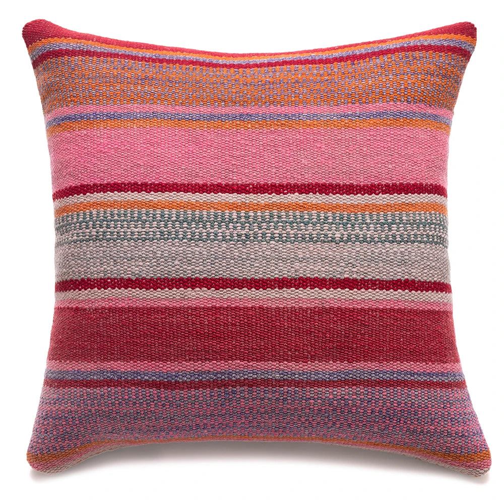 A square woven throw pillow featuring a multicolor horizontal striped pattern with shades of pink, red, orange, gray, and blue on a white background.