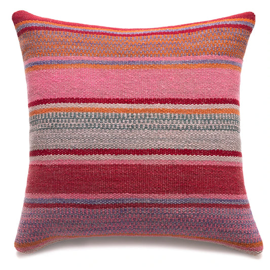 A square woven throw pillow featuring a multicolor horizontal striped pattern with shades of pink, red, orange, gray, and blue on a white background.