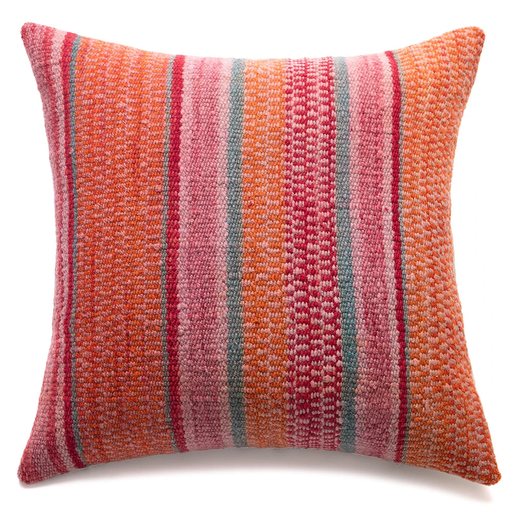 Striped pillow with orange, pink, and gray pattern on a white background