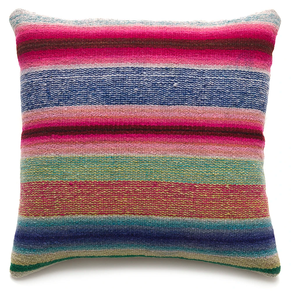 Multicolored striped pillow on a white background