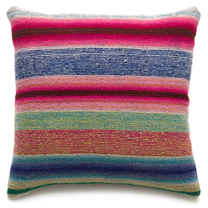 Multicolored striped pillow on a white background