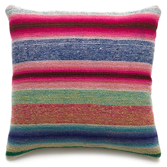 Multicolored striped pillow on a white background