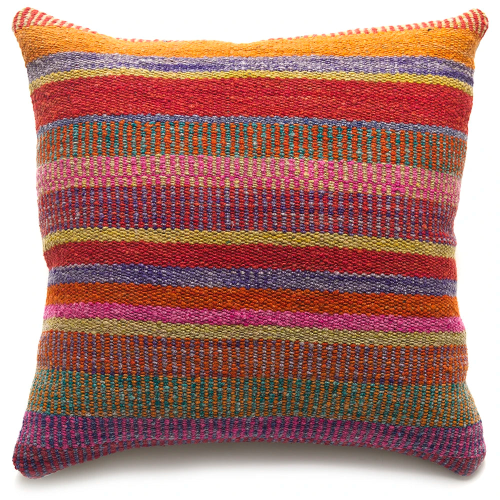 Multicolored striped pillow on a white background