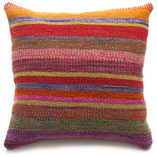 Multicolored striped pillow on a white background
