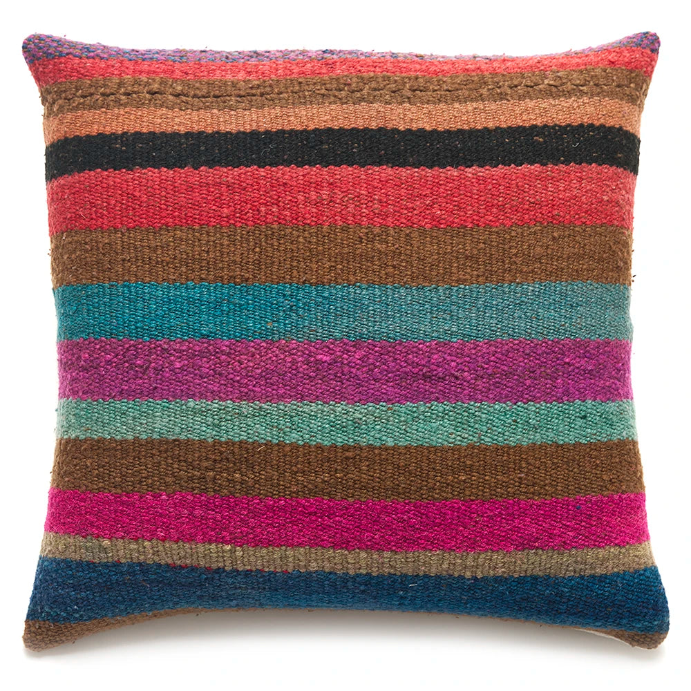 Multicolored striped pillow on a white background