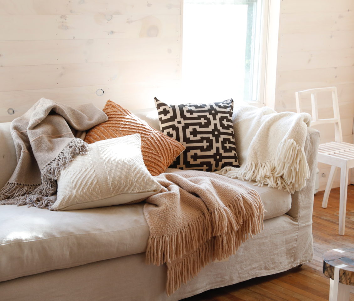 Natural fiber throw pillows top
