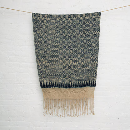 Traditional handwoven ikat textile from Northern Peru made of 100% cotton, featuring intricate macramé border – artisan-crafted and one-of-a-kind.